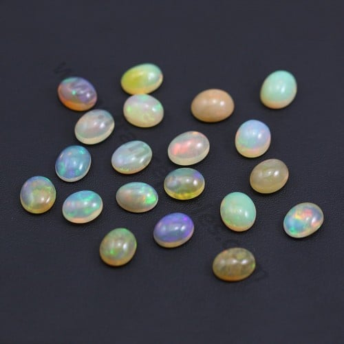 Ethiopian opal in cabochon, multicolored, in oval shape 9 * 11mm x 1pc