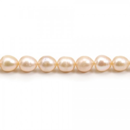 Salmon color round freshwater pearls on thread 9-10mm x 40cm