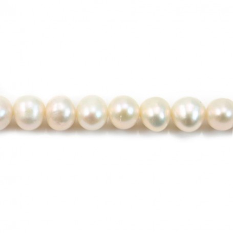 White oval freshwater pearls on thread 7-8mm x 40cm