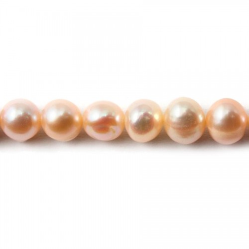 Freshwater cultured pearls, salmon, oval, quality 7-8mm x 36cm