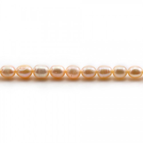 Salmon freshwater cultured pearl, olive shape 5.5-6.5mm x 37cm