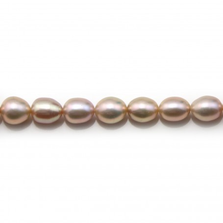 Pinkish oval freshwater pearls on thread 5-7mm x 40cm