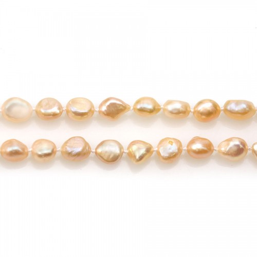 Long necklace in oval salmon fresh water pearl, measuring 8 * 10mm x 1pc