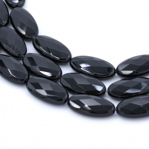 Black onyx, oval faceted, 15x30mm x 40cm