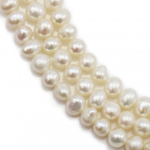 Perles d'eau douce blanches ovales sur fil 4-5mm x 40cm