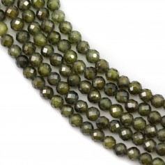 Zirconium oxide 2mm, in green color, in round faceted shape x 39cm