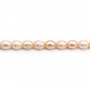 Salmon freshwater cultured pearl, olive shape 6.5-7.5mm x 40cm
